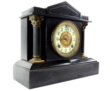 A late 19thC French style black slate and gilt metal portico shaped clock, the enamel style dial stamped for the Ansonia Cloc