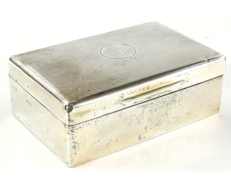 A George V silver rectangular cigarette box, the hinged lid with engine turned decoration and inscription Frank Nov. 13 1925 