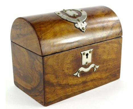 A Victorian walnut tea caddy, the domed lid with silver plated engraved vacant cartouche, enclosing two lidded compartments, 