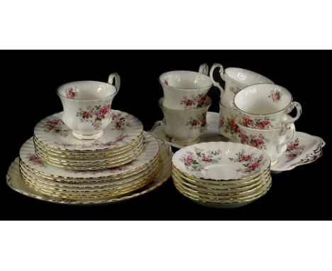 A Royal Albert Lavender Rose pattern part tea service, to include seven cups, various saucers, plates, tea plates, cake plate