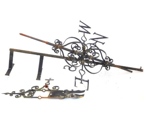 A wrought iron weather vane, the top mounted with a stylised flag and pointer, 163cm high.  By family repute, holes to top, p
