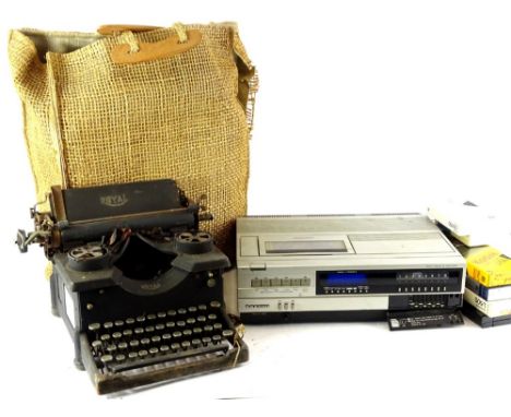 A Sanyo Betacord Betamax video player, various videos and a portable typewriter.