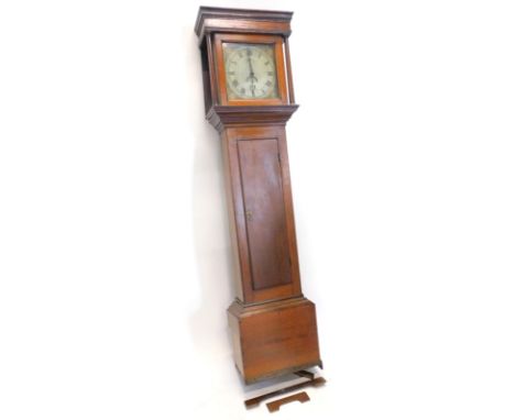 An early 19thC mahogany and oak longcase clock, the square dial painted with patera and with Roman numerals etc., in plain mo