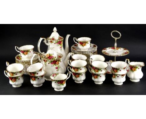 A Royal Albert Old Country Roses pattern part tea service, to include teapot, coffee pot, various cups, cake stand, etc., wea