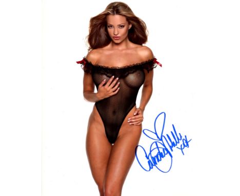 Playboy Playmate and sexy model Candice Michelle signed 8x10 photo. Good condition. All autographs come with a Certificate of