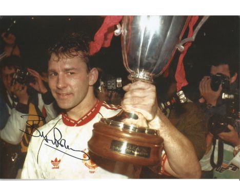 Brian Robson signed 12x8 colour photograph pictured during his time playing for Manchester United. Good condition. All autogr