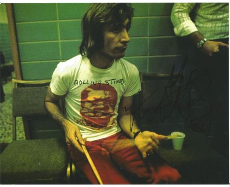 Charlie Watts signed 12x8 colour photograph pictured during his time playing in the rock and roll band Rolling Stones. Good c