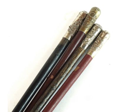 Three British Regimental swagger sticks with white metal tops, comprising Hampshire Regiment, Royal Marines, South Wales Bord