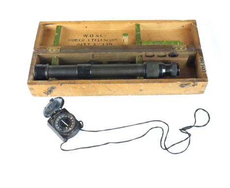 A German Second World War bakelite marching compass by CXN (Emile Busch) with white stencilled letter 'A' to the cover togeth
