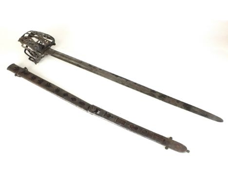 A Scottish basket-hilted sword 18th/19th century with later replaced 74cm single-fullered blade, each of the inner and outer 