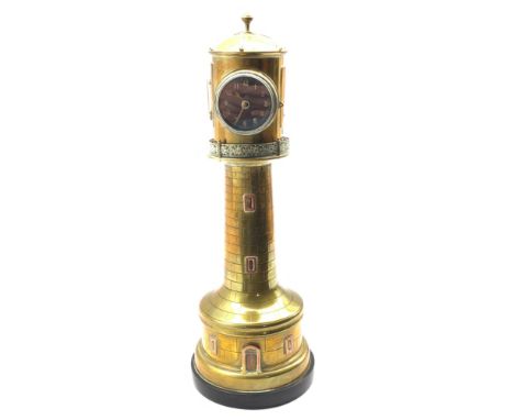 Late 19th/Early 20th century French automaton brass lighthouse clock, revolving top with clock, aneroid barometer and thermom