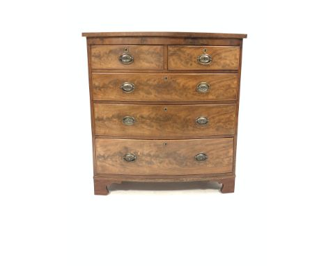 Victorian mahogany bow front chest, fitted with two short and three long graduated drawers, raised on shaped bracket supports