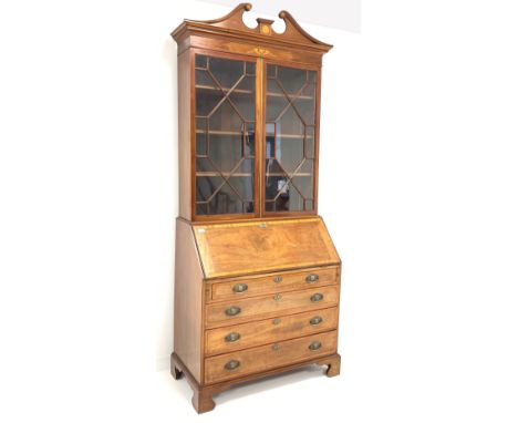 George III mahogany bureau bookcase, swan neck pediment with paterea inlay over astragal glazed doors enclosing three adjusta