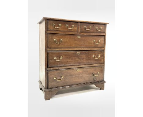 19th century oak chest fitted with two short and three lon graduated drawers, brass swan neck pull handles, raised on bracket