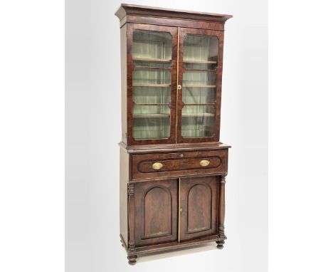 Georgian mahogany secretaire bookcase, glazed doors enclosing three adjustable shelves, fall front drawer under fitted with b