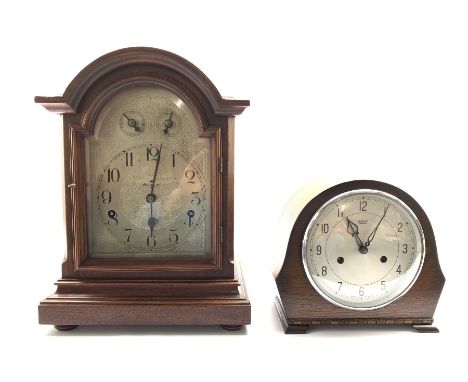 German walnut cased mantel clock by Kienzle, silvered dial with Arabic chapter ring, Westminster chiming movement with silent