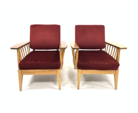 Vintage Pair of mid 20th century retro elm and beech open armchairs, with red velvet upholstered back and loose cushions, rai