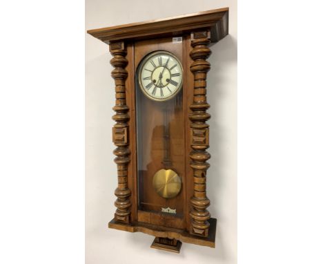 Walnut and beech cased Vienna style wall clock, with white dial with Roman chapter ring, twin train movement striking hammer 