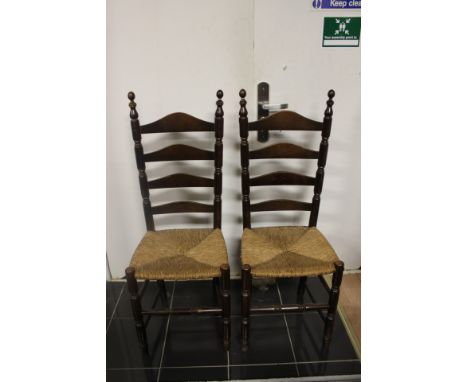A set of a six Shaker style rush seated ladder back chairs (6)