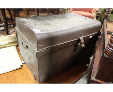 An early 20th Century tin trunk, together with an oak side table (2)