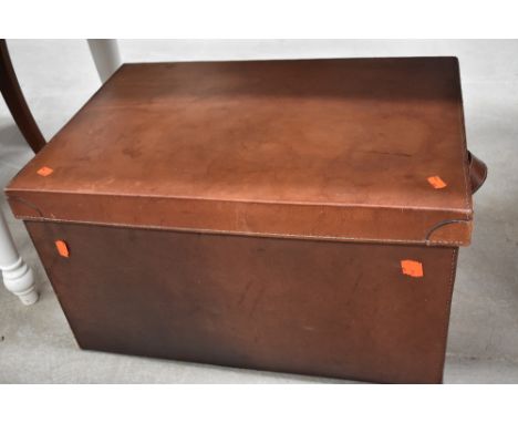 A vintage leather travel trunk, approx. dimensions 69 x 48 x 39cm , unlabelled but lined and looks real high quality