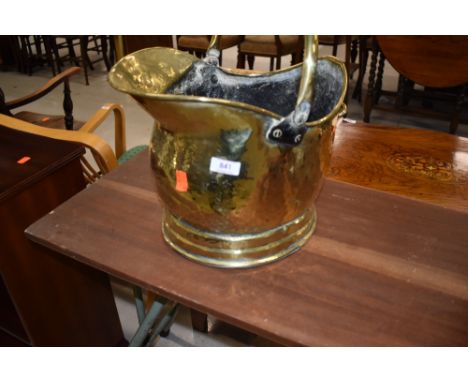 A traditional brass coal helmet