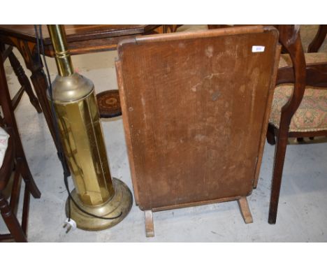 A vintage oak folding firescreen table