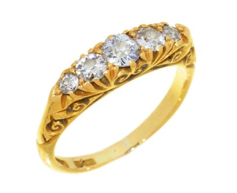 A FIVE STONE DIAMOND RING in 18ct gold, 3.3g, size K ½  No damage to diamonds. Light wear to gold consistent with age and use