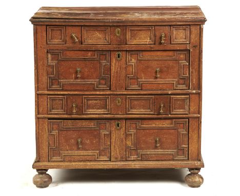 A WILLIAM III GEOMETRIC MOULDED OAK CHEST OF DRAWERS, C1700&nbsp;&nbsp; on bun feet, the sides panelled, 91cm&nbsp; h; 52 x 9