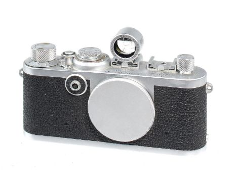 A LEICA IF CAMERA, NO 683463, 1955 leather eveready case and a Leica lens hood  Camera body in good condition