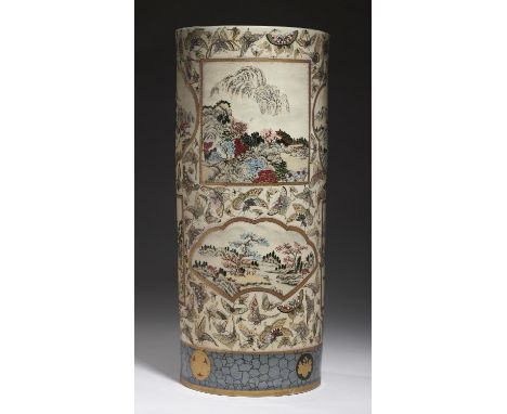 A JAPANESE SATSUMA EARTHENWARE STICK STAND, EARLY 20TH C&nbsp; decorated with fan and other landscape panels on a ground of b