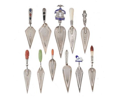 ELEVEN VICTORIAN-GEORGE V SILVER TROWEL BOOK&nbsp; MARKS&nbsp; one with enamelled WEMBLEY 1924 lion handle, 6-10.5cm l, vario