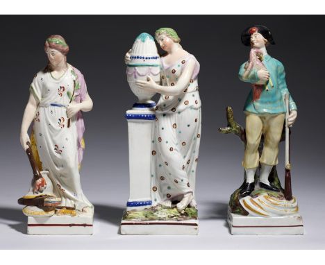 THREE STAFFORDSHIRE PEARLWARE FIGURES, ONE C 1790-1800, THE OTHERS C1810-20&nbsp; of AndromOche, Peace and a Sportsman, with 