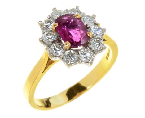 A RUBY AND DIAMOND CLUSTER RING&nbsp;in 18ct gold, London 1983, 3.5g, size M  Good condition