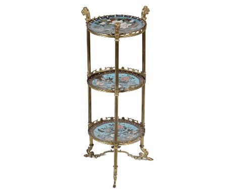 A GILT BRASS ETAGERE AND THREE CONTEMPORARY JAPANESE CLOISONNE ENAMEL DISHES, LATE 19TH C&nbsp; with lion's head terminals an