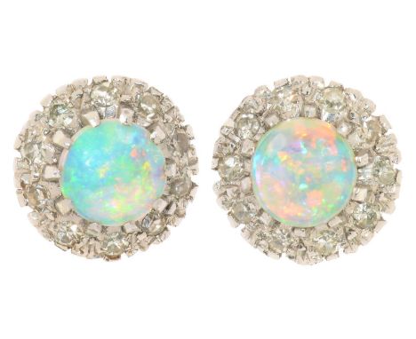 A PAIR OF OPAL AND DIAMOND EARRINGS in white gold, 10 mm w, marked 9ct, 4g In good condition, light wear consistent with age 