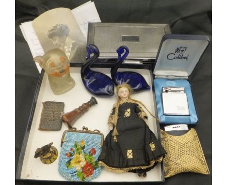 A late Victorian German miniature doll in mourning dress, together with photograph of owner and note of provenance, a 1920's 