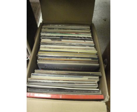 Four boxes of various LP records to include Genesis, Police, George Benson, Chris Rea, Jackson Browne, Ricky Lee Jones, Elton