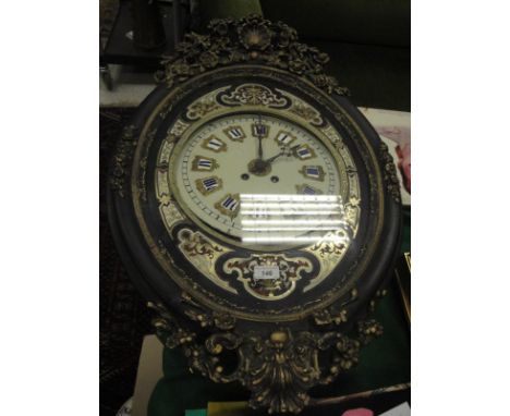 A 19th Century French wall clock, the eight day movement by Valery of Paris, housed in an ebonised and boulle work decorated 