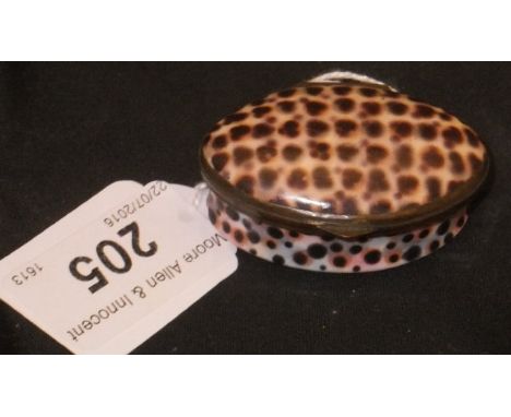 A late 18th Century Bilston enamel oval patch box of waisted form, decorated with simulated shell, the top opening to reveal 