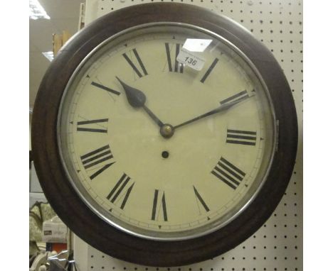 A stained beech framed circular wall clock, the dial with Roman numerals, together with a Eumig Type P8 projector, splicer, e