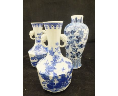 A Chinese porcelain baluster shaped vase decorated in blue and white with butterflies and scrolling foliage in underglaze blu