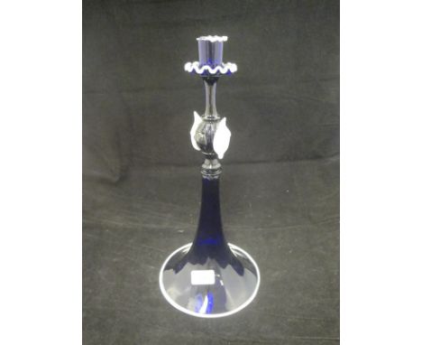 A Venetian style Bristol Blue glass candlestick with white glass borders and decoration