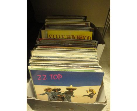 Two boxes of various LP records to include Dire Straits, Smiths, Ted Nugent, Pink Floyd, Pat Metheny Group, Fleetwood Mac, Do