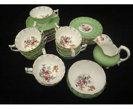 A box containing a small collection of Dresden porcelain coffee wares painted with floral sprays, together with a collection 