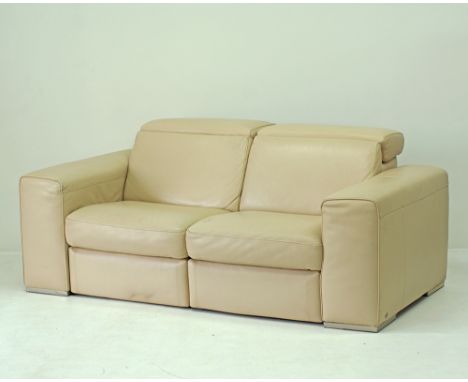 A Natuzzi leather two seat sofa / loveseat, modular seats with electric recliner lounge seats. W190cm, D100cm, H78cm.