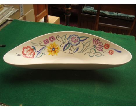 A large 1950's Poole pottery dish, painted with flowers. 