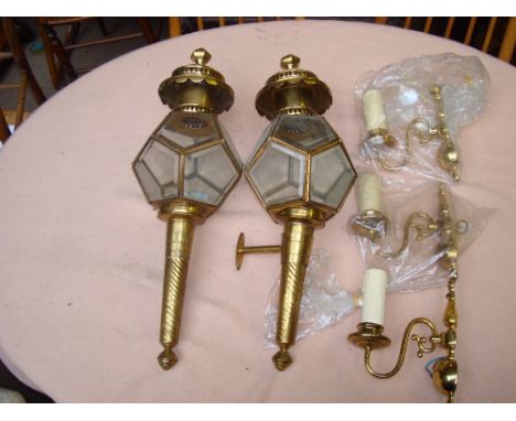 Two brass hall lanterns and three brass light fittings. 