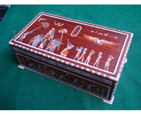 An early 20th Century Egyptian Revival jewellery box, inlaid with bone and mother of pearl. 