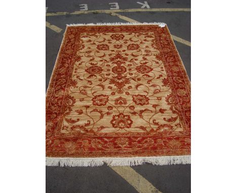 A beige ground Ziegler style carpet.230 x 160cm. 